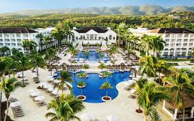 Hyatt Ziva Rose Hall family-friendly all-inclusive resort in Jamaica with waterpark, beachfront pools, and modern accommodations.