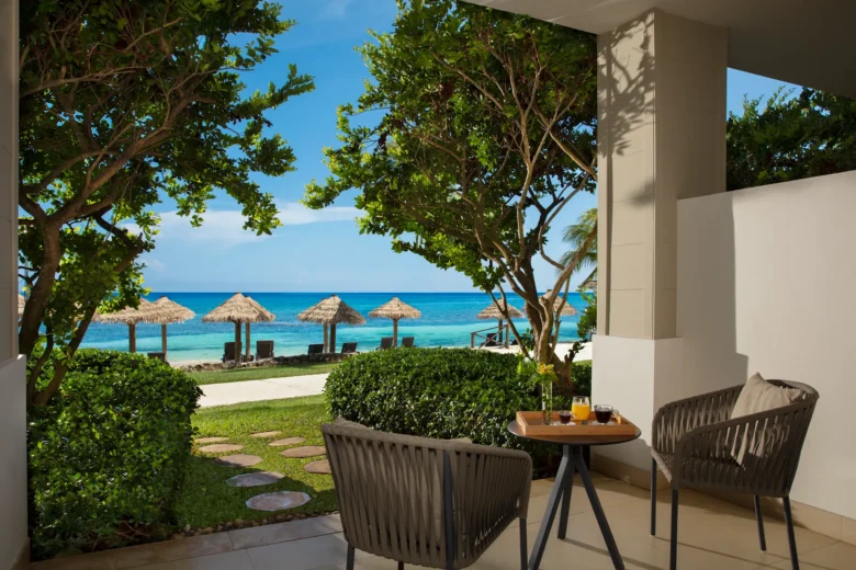 Preferred Club Premium Junior Suite Beachfront terrace with direct beach access at Secrets Wild Orchid Montego Bay.