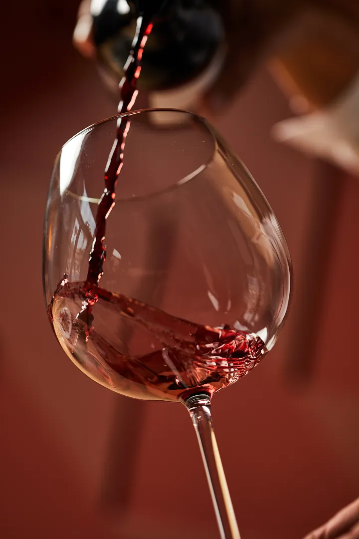 Rendezvous Lobby Bar at Secrets Wild Orchid Montego Bay featuring live piano music, elegant seating, and handcrafted cocktails.