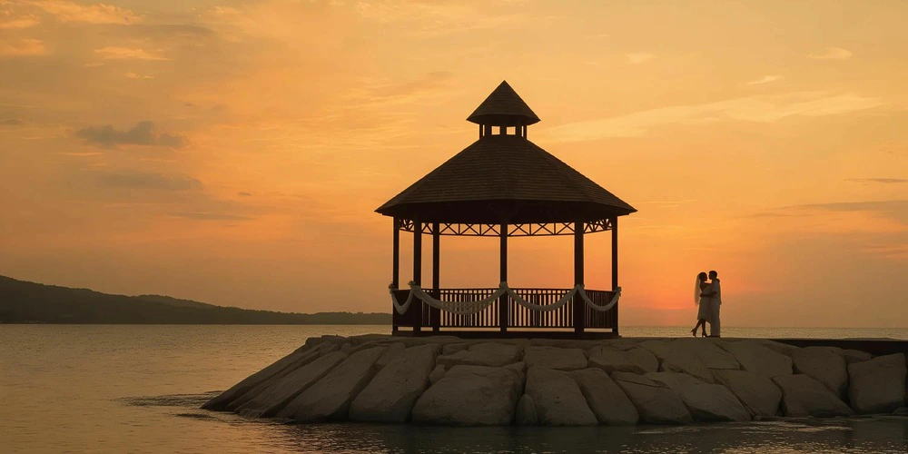 Intimate sunset wedding ceremony at Smaller Gazebo at Secrets Wild Orchid Montego Bay